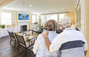 Senior Couple Overlooking A Beautiful Living Room