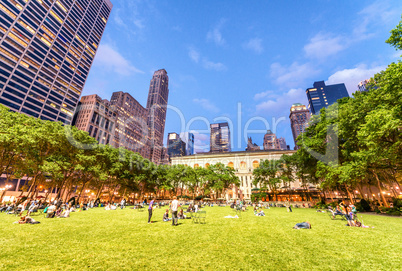 NEW YORK CITY - JUNE 8, 2013: Locals and tourists relax in Bryan