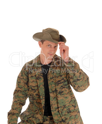 Soldier in uniform and hat..