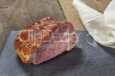 smoked pork chop on wooden table