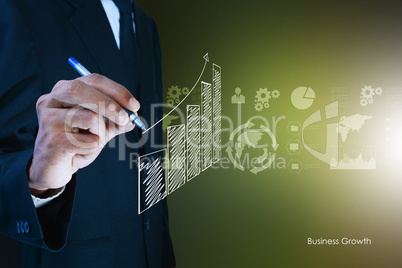 business man drawing growth graph.