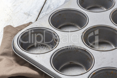 Muffin tray on wooden table