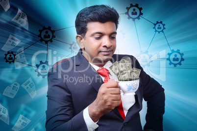 Business man with tea cup and currency notes