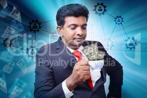 Business man with tea cup and currency notes