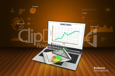 Laptop showing a spreadsheet and a paper with statistic charts