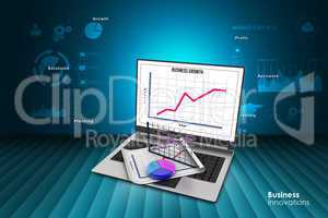 Laptop showing a spreadsheet and a paper with statistic charts