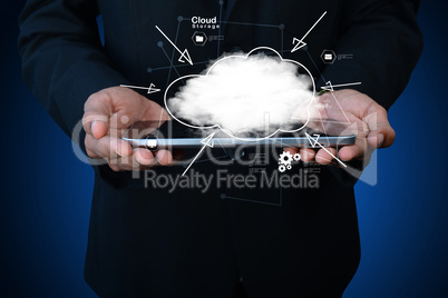 businessman holding cloud network icon on tablet computer
