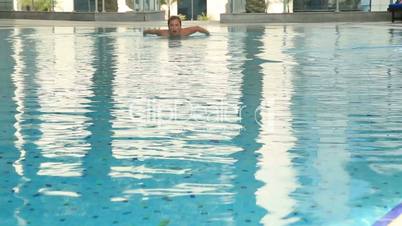 Woman Swimming in a pool