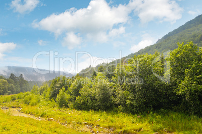 picturesque mountain valley and creek