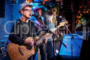 Band performs on stage