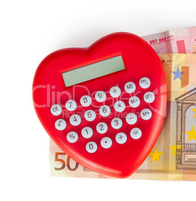 Red heart shaped calculator with euro banknotes.