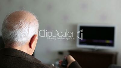 Senior Man Watching Television