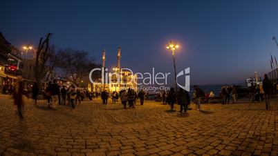 time lapse photography, people walking Ortakoy square, night