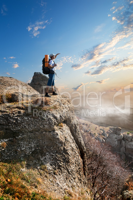 Tourist on rock