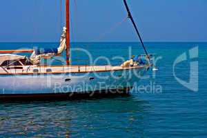 Digital painting of a yacht moored in harbor