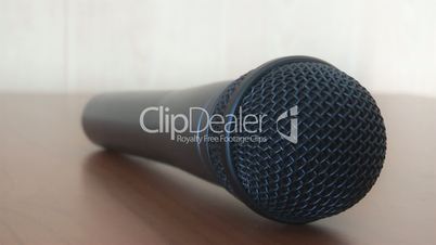 microphone rolls on the table