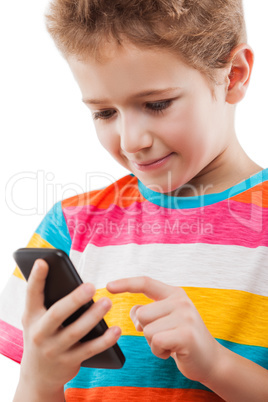 Smiling child boy talking mobile phone or smartphone