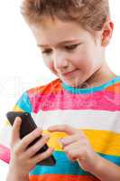 Smiling child boy talking mobile phone or smartphone