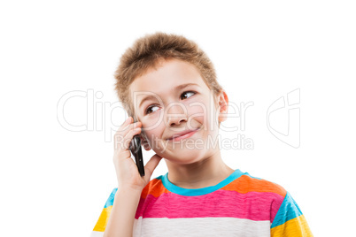 Smiling child boy talking mobile phone or smartphone