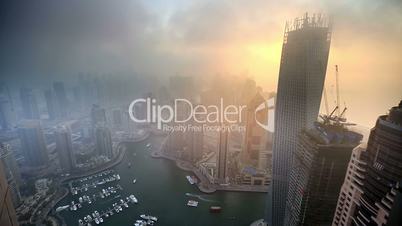 time lapse aerial view foggy weather Dubai Marina