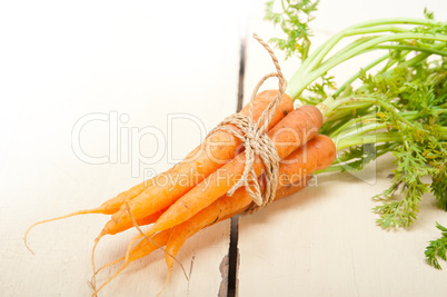 baby carrots bunch tied with rope