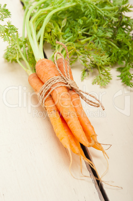 baby carrots bunch tied with rope