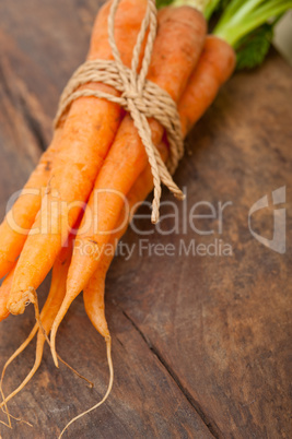 baby carrots bunch tied with rope