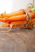 baby carrots bunch tied with rope