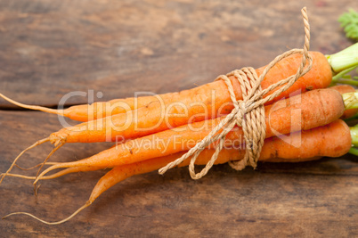 baby carrots bunch tied with rope