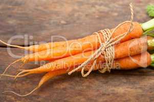 baby carrots bunch tied with rope