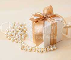 Gift box and pearl necklace.