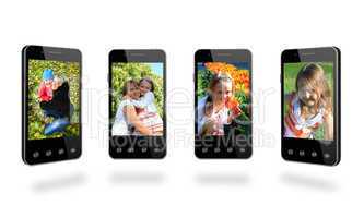 four smart-phones with colored images isolated on the white
