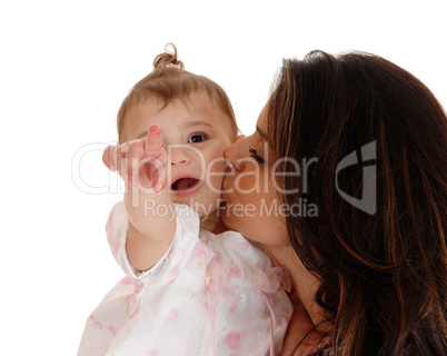 Mother kissing her baby.