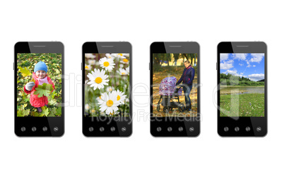 four smart-phones with colored images isolated on the white