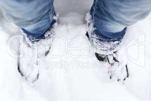 Snowy mountain shoes with blue jeans