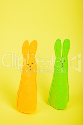 Two easter Bunnys on yellow