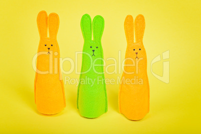 Three easter Bunnys on yellow