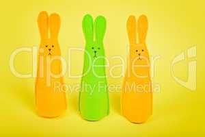 Three easter Bunnys on yellow