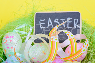 Easter ribbon with eggs and board