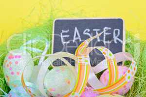 Easter ribbon with eggs and board