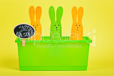 Easter Bunnies in flower pot with chalkboard