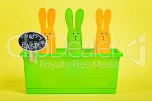 Easter Bunnies in flower pot with chalkboard