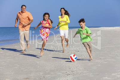 Family Playing Football Soccer on Beach