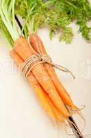 baby carrots bunch tied with rope