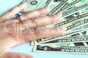 woman's hand purchasing the ring with topaz