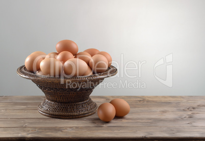 hicken eggs in a wicker bowl