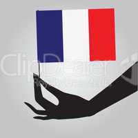 Hand with France flag