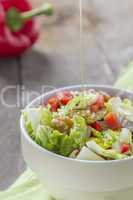 Salad with oil in Bowl