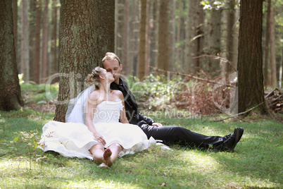 Bride kiss in the forest