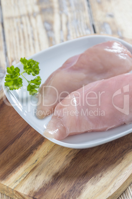 Chicken Breast on wooden Board